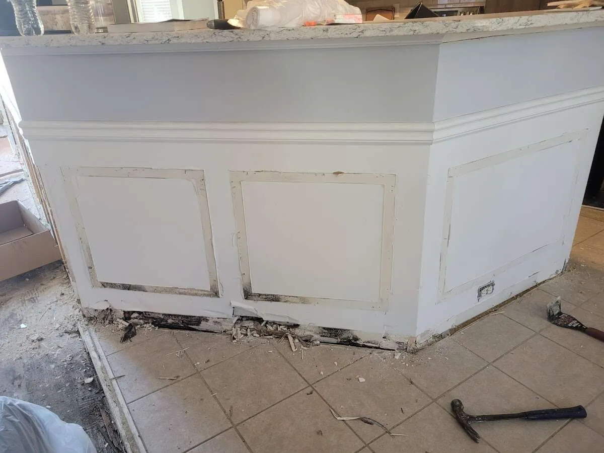 Water damage and mold on kitchen during Storm Damage Restoration in Wellington